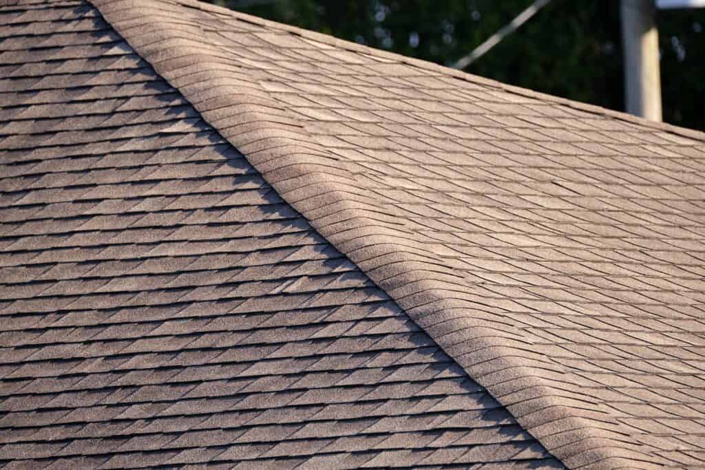 a brown shingled roof.
