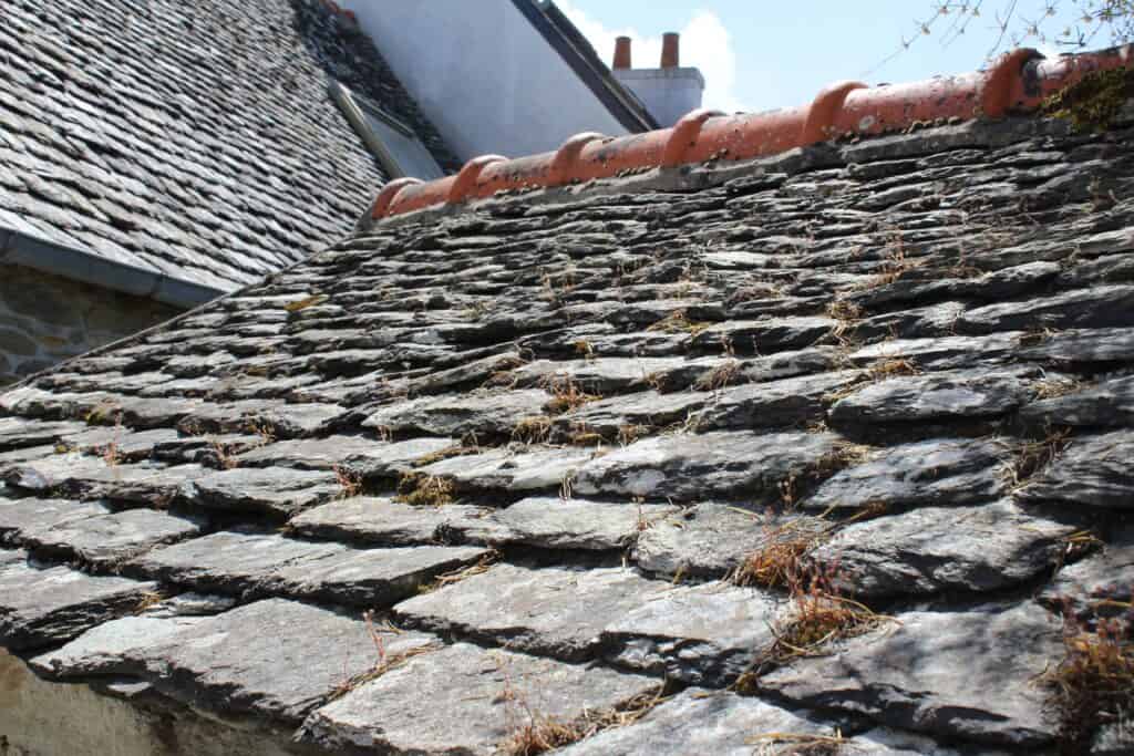 the roof of a building is made of stone.