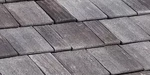 a close up view of a grey shingled roof.